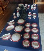A large collection of Royal Worcester Regency pattern Dinner and tea set services , in Red and gilt.