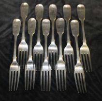 A matched set of ten Victorian silver fiddle pattern dessert forks, each with crest and initials