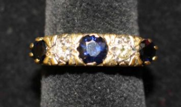 Vintage 18ct Yellow Gold Sapphire and round brilliant cut Diamond Five Stone Ring. Contains three