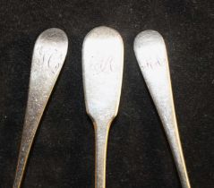 A set of three George III silver teaspoons, London 1807, a set of three Edwardian silver