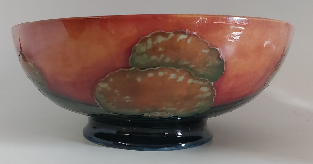 A Moorcroft Eventide pattern footed bowl, C1918 -1926 with full signature to base in Blue.