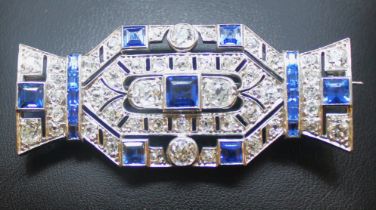 Art Deco Sapphire and Diamond Brooch.  Contains two old cut diamonds in the centre at either side