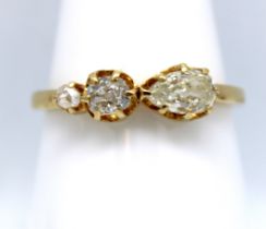Antique, circa 1860-1890's unmarked yellow metal custom made Three Stone Diamond dress ring.