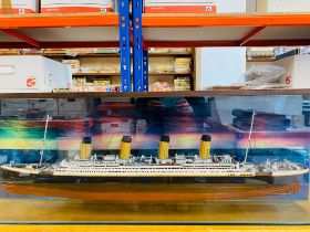 RMS Titanic. A wooden, kit-built, hand-painted 1/250 scale model, 2001, 95cm long, constructed