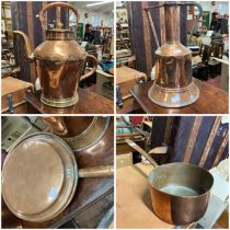 A collection of four copper items, two kettles, a pan and a bed pan with wooden handle (4)