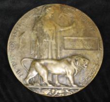 A bronze World War I casualty memorial plaque  "He died for Freedom and Honour" awarded to William