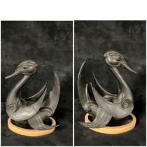 An Oriental inspired bronze swan, approximately 23cm high.