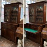 An Astragal glazed mahogany book case over secretaire base with two cupboards under  232cm h x 124 w