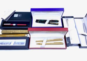 A collection of pens comprising: Waterman cased pair of fountain & ballpoint pens; S. T. Dupont