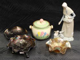 A Clarice Cliff crocus pattern biscuit barrel and cover, a Nao figure of a girl with rabbits and