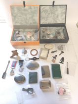 A collection of curiosities to include compacts, cigarettes cases, badges and coins ( 2 ) View all
