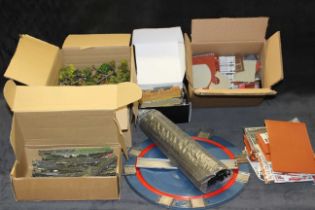 Selection of parts accessories and materials for model railway layout.