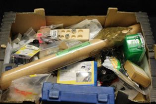 Box of assorted parts accessories and tools for railway layout or model makers.