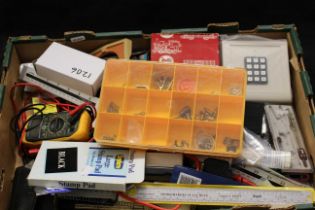 Box of assorted parts accessories and tools for railway layout or model makers.