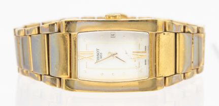 A ladies Tissot gold plated wristwatch, comprising a rectangular mother orf pearl dial with dot