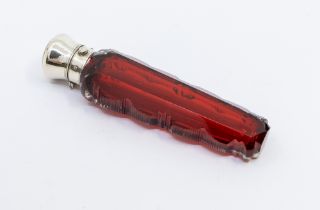 A Victorian silver mounted tapering ruby glass scent bottle, cut and ridged edges, plain silver