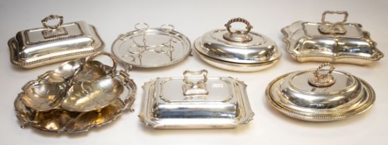 A collection of silver plate to include five various Georgian style entree dishes, covers, some with