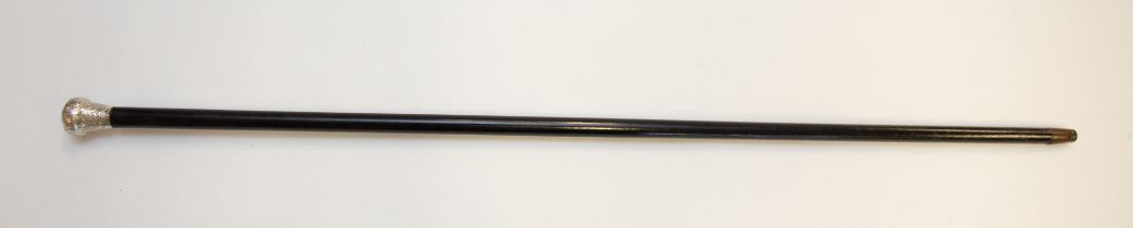 A George V silver topped ebonised wooden walking stick, having profusely engraved circular flower