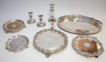 A collection of silver plate to include: a large oval two handled tray with pierced gallery rail,