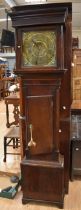 A mid 18th century 30-hour longcase clock with square brass dial face, maker's name and area over-