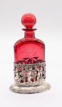 A late 19th Century 830 standard probably Hanau silver oval scent bottle holder, pierced and