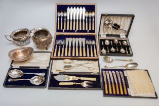 A large collection of silver plated items; cased and uncased flatwares, cutlery, plated coasters,