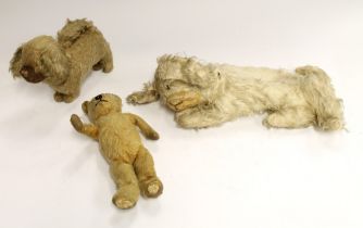 An early 20th century straw-filled dog, an early 20th century stuffed bear and an early 20th century