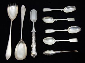 A small quantity of silver flatware to include; an American sterling silver stylised handled