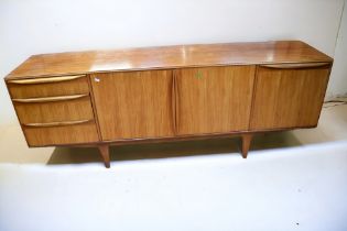 1960s/70s Scottish McIntosh teak sideboard with three side drawers along side two central cupboard