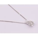 Single brilliant cut diamond in white cushion shaped illusion plate pendant, estimated dia wt 0.