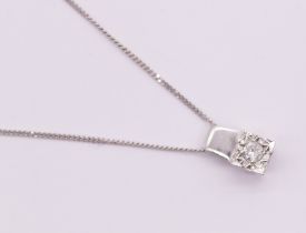 Single brilliant cut diamond in white cushion shaped illusion plate pendant, estimated dia wt 0.