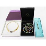 A collection of costume jewellery to include a Christian Dior gold plated necklace along with a