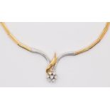 A diamond set 18ct gold necklet, comprising a yellow and white gold cross over front inset with a