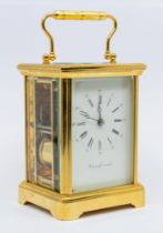 Asprey & Garrard - A boxed brass cased carriage clock, with 11 jewels workings and marked "Asprey &