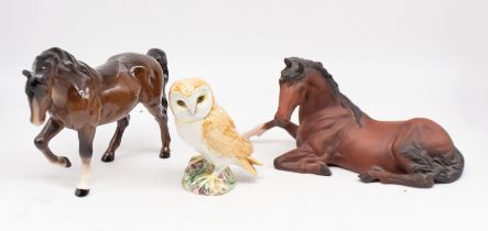 A John Beswick horse and owl along with a Royal Doulton horse.