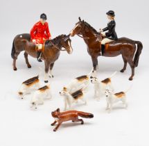 John Beswick china hunting set, two brown horses, six dogs a and a fox.