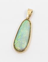 An opal and 9ct gold pendant, comprising a pear shaped elongated white opal, approx 26 x 10mm, green