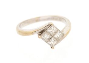 A diamond and 9ct white gold ring, comprising four princess cut diamonds tension set to a square