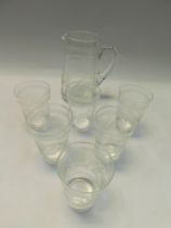 A 20th century crystal cut glass lemonade set consisting of jug and six tumblers, all with floral