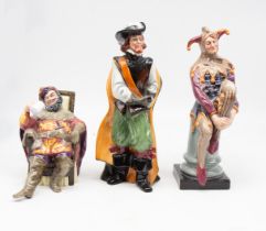 Three mid 20th Century Royal Doulton figures to include the Cavalier, the Foaming Quart and the