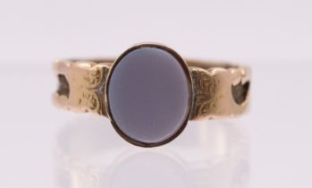 An oval Victorian sardonyx inlaid with hair mourning ring, stone measures approx 10mmx8mm in above