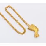An Egyptian gold pendant in the form of Nefertiti, Egyptian gold mark for 18ct, weight approx 2.6gms
