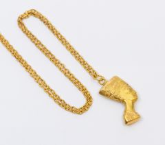 An Egyptian gold pendant in the form of Nefertiti, Egyptian gold mark for 18ct, weight approx 2.6gms