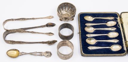 A collection of silver to include; a cased set of six teaspoons by Goldsmiths & Silversmiths Co Ltd,