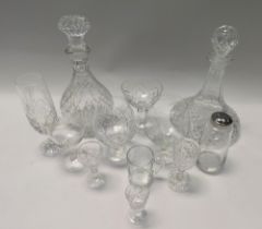 A large collection of mid to late 20th Century cut and crystal glassware to include decanters,