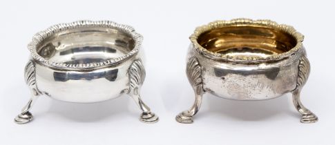 A George II silver circular salt, gilt interior, fluted edge and three feet, hallmarked London,