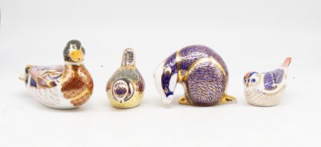 Four Royal Crown Derby gold stopper paperweights to include mallard, badger, tit and crested tit.