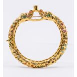 Mughal style gilt metal stone set bangle, comprising dragon heads set with various tones including