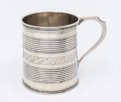 A George III silver christening mug, having ribbed banded design to body, foliage engraved design