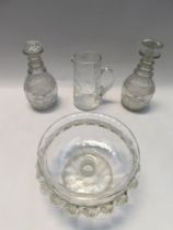 A small selection of glasswares to include; two 19th century graduating cut glass decanters, a